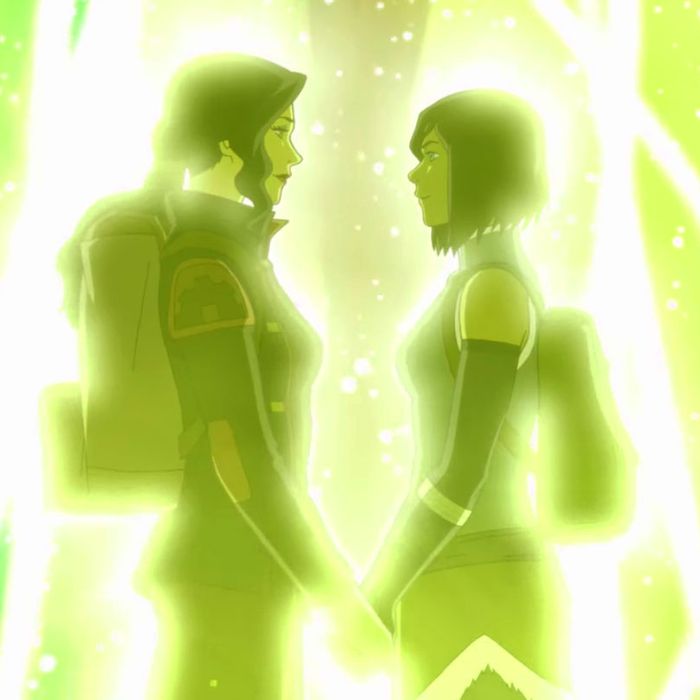 Korra and Asami holding hands, facing each other